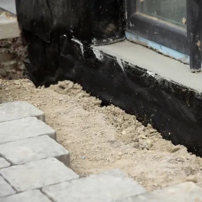 Interior basement drainage system for Auburn home